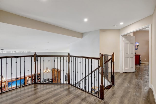 15852 SW 14th St, Pembroke Pines, FL 33027 - hall with wood finished floors, an upstairs landing, and recessed lighting