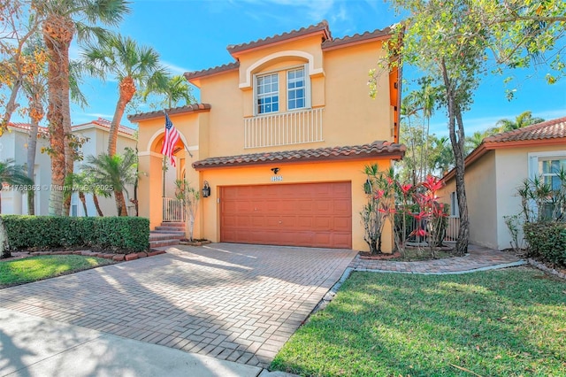 15852 SW 14th St, Pembroke Pines, FL 33027 - mediterranean / spanish-style home featuring a garage, a tiled roof, decorative driveway, stucco siding, and a front yard