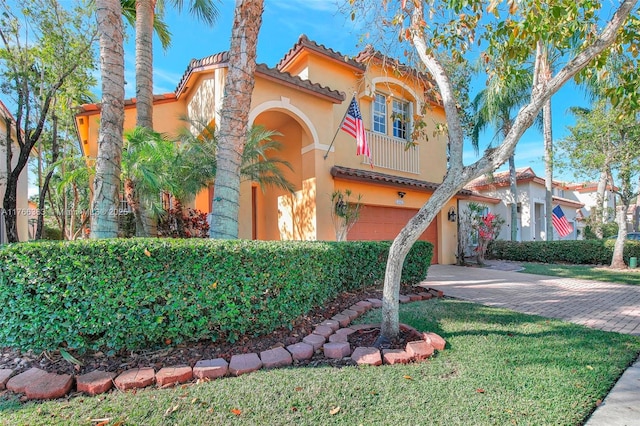 15852 SW 14th St, Pembroke Pines, FL 33027 - mediterranean / spanish-style house featuring stucco siding, a garage, driveway, and a tile roof