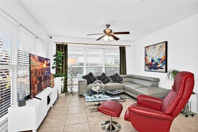 3449 NE 17th Way, Oakland Park, FL 33334 - living room with light tile patterned floors and a ceiling fan