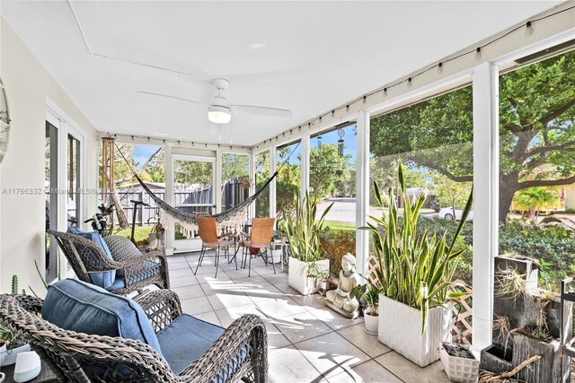 3449 NE 17th Way, Oakland Park, FL 33334 - sunroom featuring ceiling fan and plenty of natural light