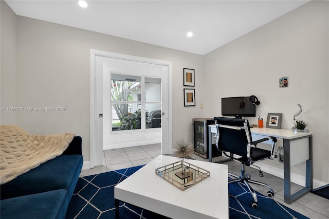 office space featuring tile patterned floors, baseboards, and recessed lighting
