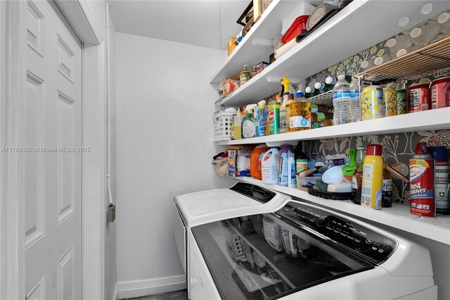 3449 NE 17th Way, Oakland Park, FL 33334 - storage area with washing machine and clothes dryer