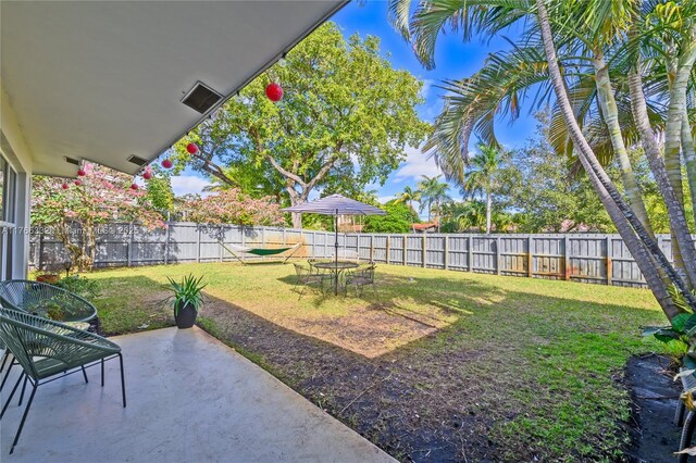 3449 NE 17th Way, Oakland Park, FL 33334 - view of yard featuring a patio