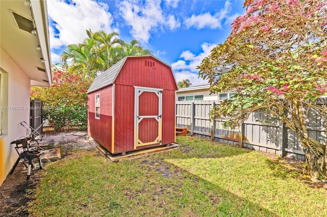 view of shed featuring a fenced backyard