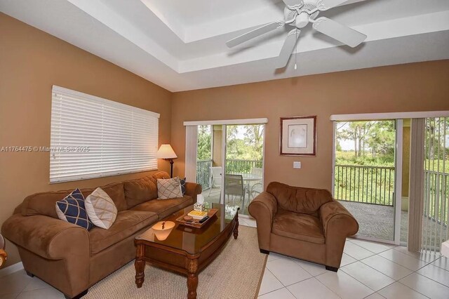 8910 Sandshot Ct Unit 5123, Port St Lucie, FL 34986 - living room with healthy amount of natural light, light tile patterned flooring, and a ceiling fan