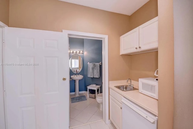 8910 Sandshot Ct Unit 5123, Port St Lucie, FL 34986 - half bathroom featuring a sink, toilet, and tile patterned flooring