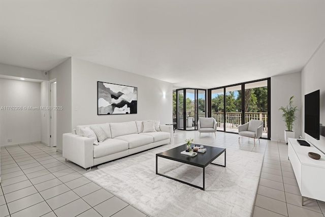 4000 Towerside Ter Unit 302, Miami, FL 33138 - living area featuring expansive windows and light tile patterned floors
