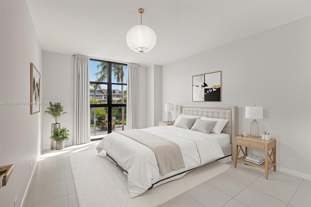 4000 Towerside Ter Unit 302, Miami, FL 33138 - bedroom featuring light tile patterned floors and baseboards