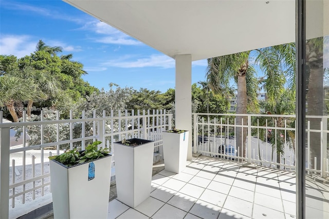 4000 Towerside Ter Unit 302, Miami, FL 33138 - view of patio with a balcony