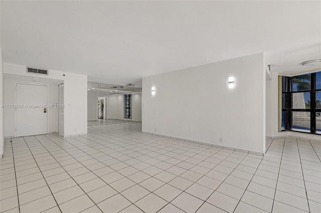 4000 Towerside Ter Unit 302, Miami, FL 33138 - empty room featuring light tile patterned floors