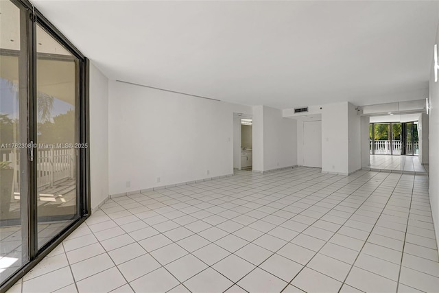 4000 Towerside Ter Unit 302, Miami, FL 33138 - empty room featuring light tile patterned flooring