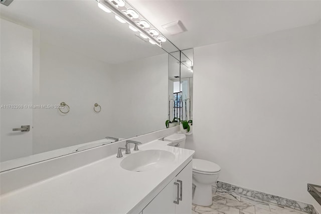 4000 Towerside Ter Unit 302, Miami, FL 33138 - bathroom featuring marble finish flooring, toilet, vanity, and baseboards