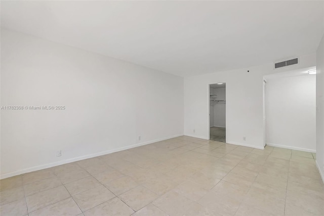 4000 Towerside Ter Unit 302, Miami, FL 33138 - spare room with baseboards