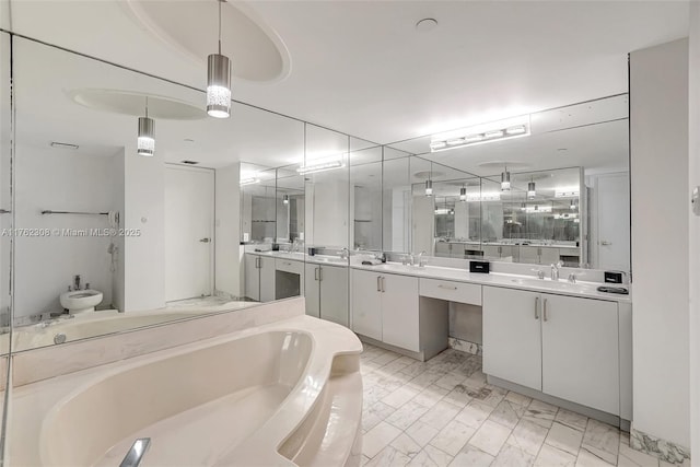 4000 Towerside Ter Unit 302, Miami, FL 33138 - bathroom with a garden tub, vanity, and a bidet