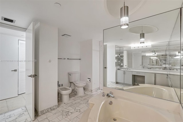 4000 Towerside Ter Unit 302, Miami, FL 33138 - bathroom featuring a bath, marble finish flooring, a bidet, toilet, and vanity