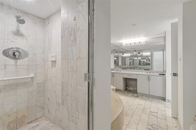 4000 Towerside Ter Unit 302, Miami, FL 33138 - bathroom featuring a shower stall, marble look tiles, vanity, and a tub to relax in