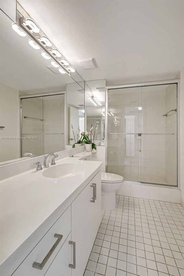 4000 Towerside Ter Unit 302, Miami, FL 33138 - full bathroom with tile patterned floors, vanity, toilet, and a shower stall