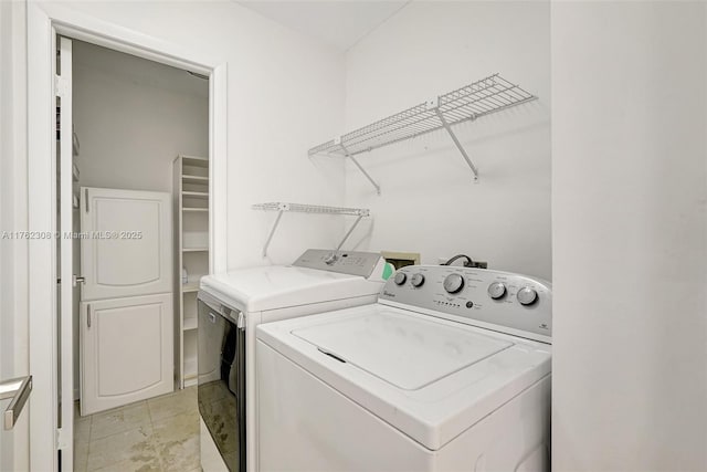 4000 Towerside Ter Unit 302, Miami, FL 33138 - washroom with washer and clothes dryer