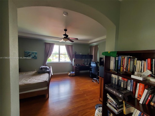 11009 NW 80th Ln, Doral, FL 33178 - bedroom featuring arched walkways and wood finished floors