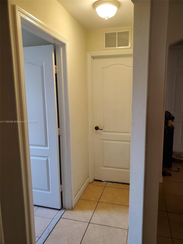 11009 NW 80th Ln, Doral, FL 33178 - corridor featuring light tile patterned flooring