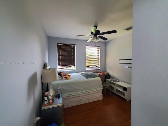 11009 NW 80th Ln, Doral, FL 33178 - bedroom with wood finished floors and ceiling fan