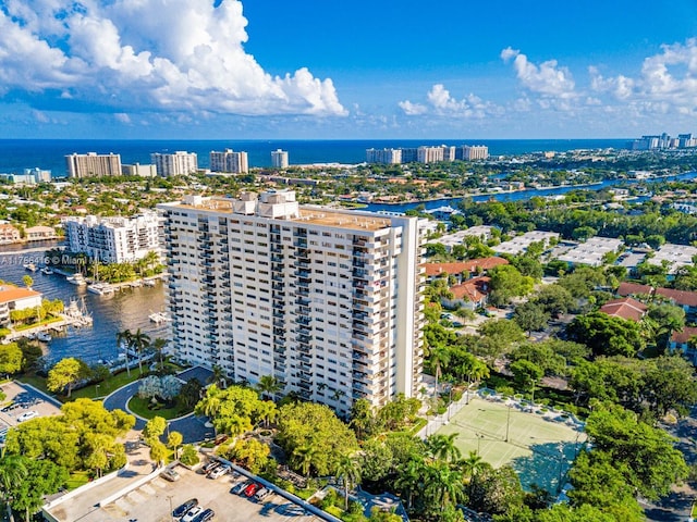 aerial view featuring a city view and a water view