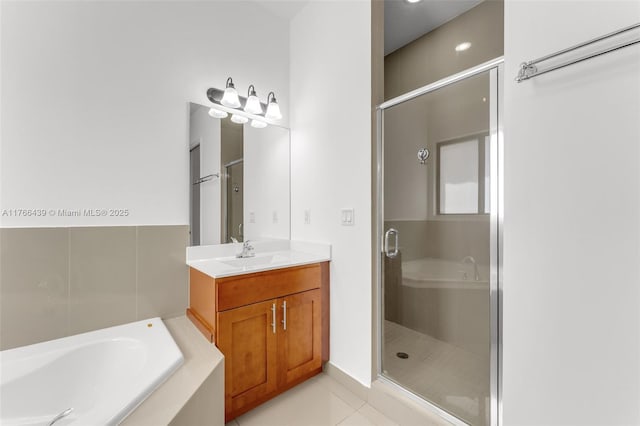 14555 SW 32nd St, Miami, FL 33175 - bathroom featuring tile patterned flooring, vanity, a bath, and a stall shower