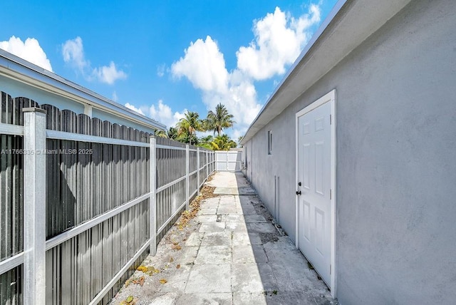 400 NW 117th St, Miami, FL 33168 - view of property exterior with fence and stucco siding