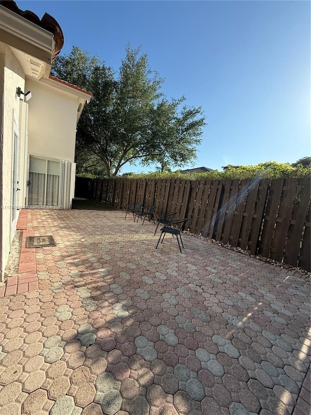 view of patio / terrace with fence