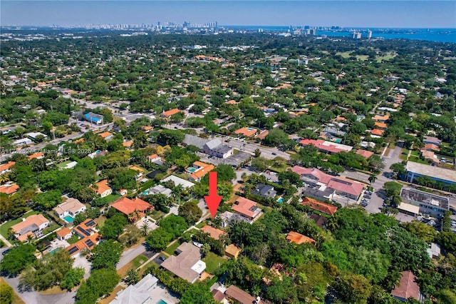birds eye view of property with a residential view
