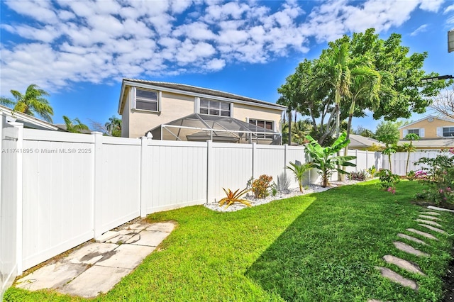 view of yard featuring a fenced backyard
