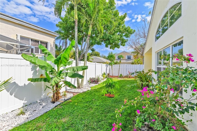 view of yard featuring fence