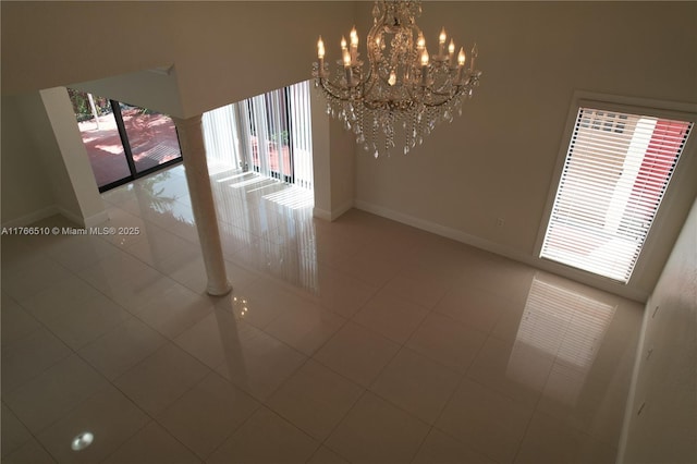 8918 SW 5th Ter, Miami, FL 33174 - spare room with plenty of natural light, baseboards, a notable chandelier, and light tile patterned floors