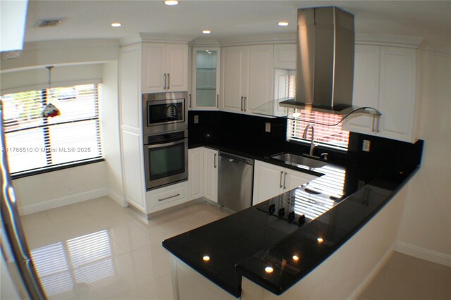 8918 SW 5th Ter, Miami, FL 33174 - kitchen with a sink, tasteful backsplash, appliances with stainless steel finishes, island exhaust hood, and dark countertops
