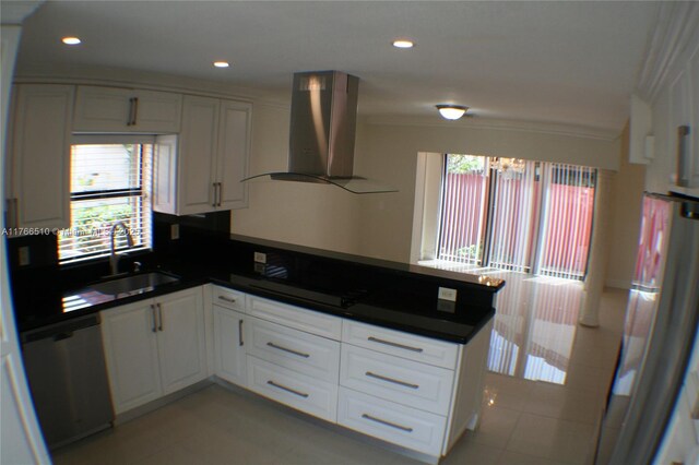 8918 SW 5th Ter, Miami, FL 33174 - kitchen with a peninsula, dark countertops, a sink, extractor fan, and stainless steel dishwasher