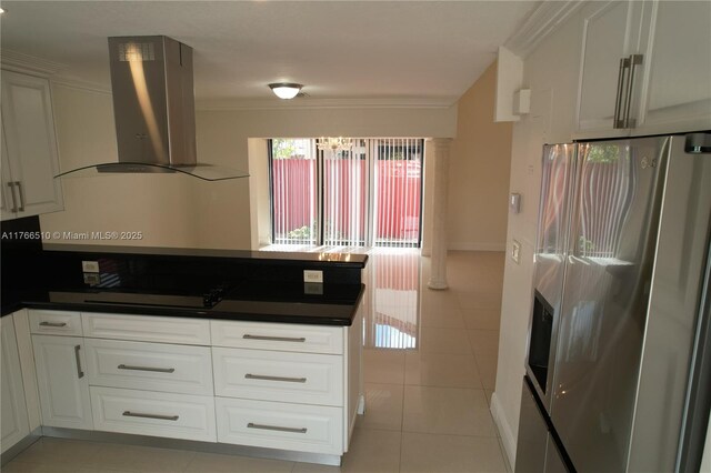 8918 SW 5th Ter, Miami, FL 33174 - kitchen with black electric cooktop, dark countertops, stainless steel fridge with ice dispenser, and ventilation hood
