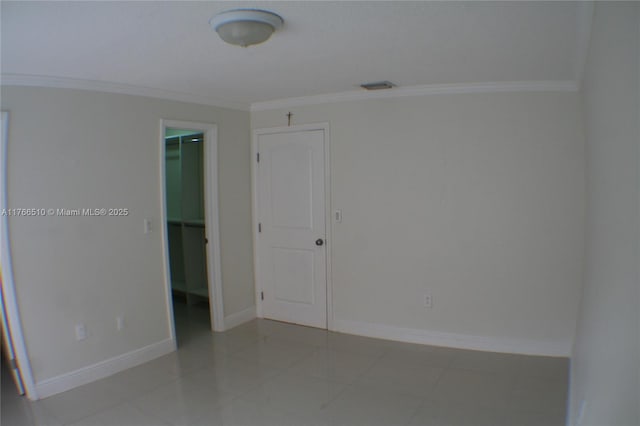 8918 SW 5th Ter, Miami, FL 33174 - empty room with light tile patterned floors, crown molding, baseboards, and visible vents