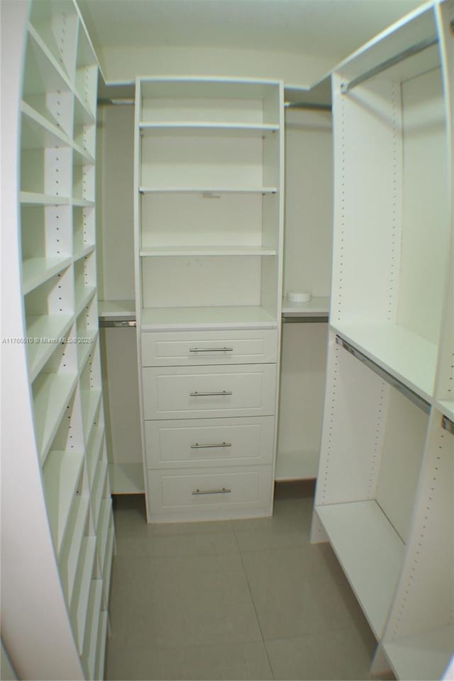 8918 SW 5th Ter, Miami, FL 33174 - walk in closet featuring light tile patterned floors