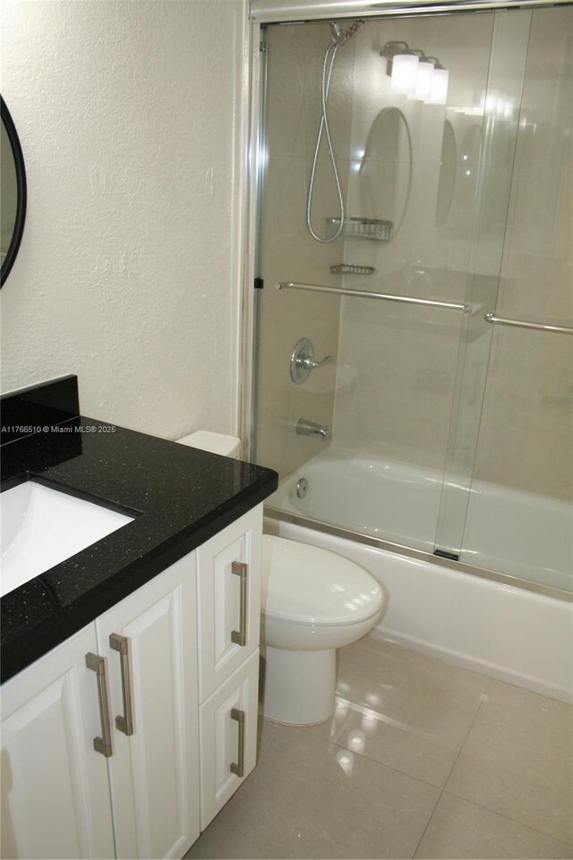 8918 SW 5th Ter, Miami, FL 33174 - full bath with toilet, shower / bath combination with glass door, tile patterned flooring, and vanity
