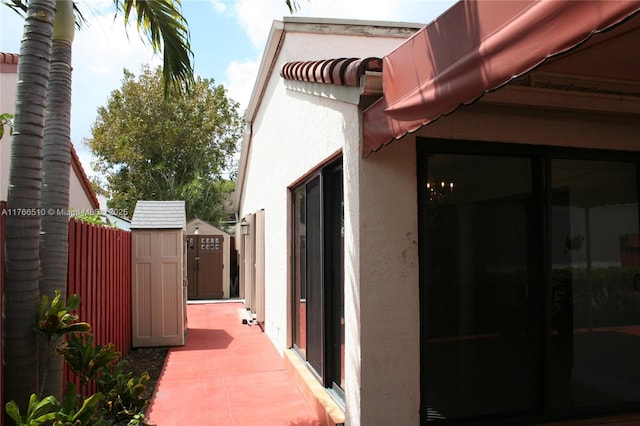 8918 SW 5th Ter, Miami, FL 33174 - view of patio with an outbuilding, fence, and a shed