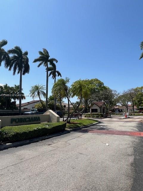 8918 SW 5th Ter, Miami, FL 33174 - view of street featuring a gated entry and curbs