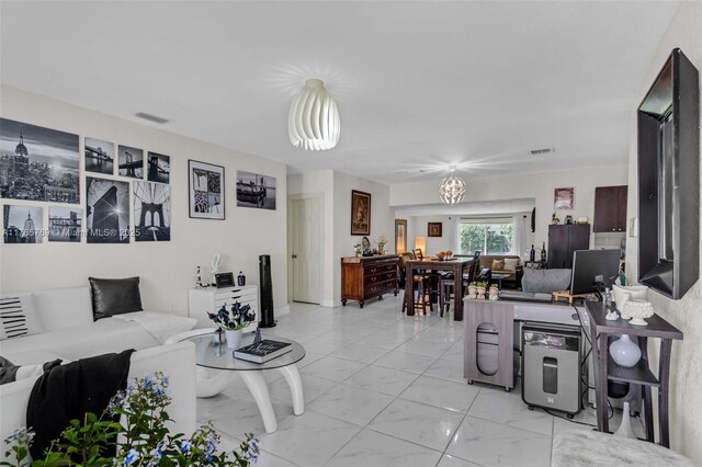 1522 NE 148th St, Miami, FL 33161 - living area featuring a chandelier, marble finish floor, and visible vents