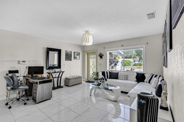 1522 NE 148th St, Miami, FL 33161 - living area featuring marble finish floor and visible vents