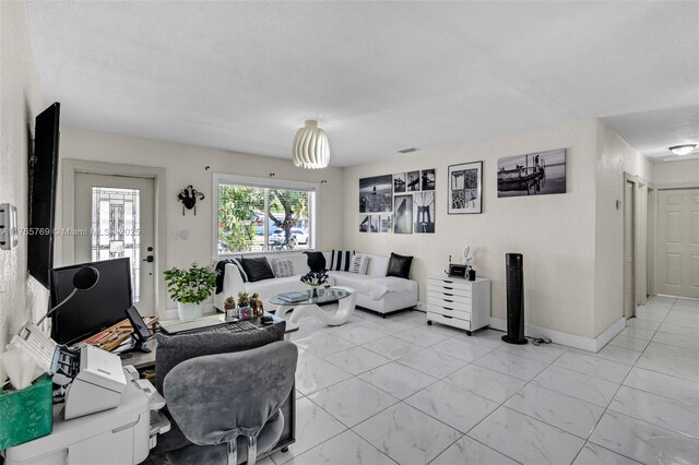 1522 NE 148th St, Miami, FL 33161 - living room with light marble finish floors