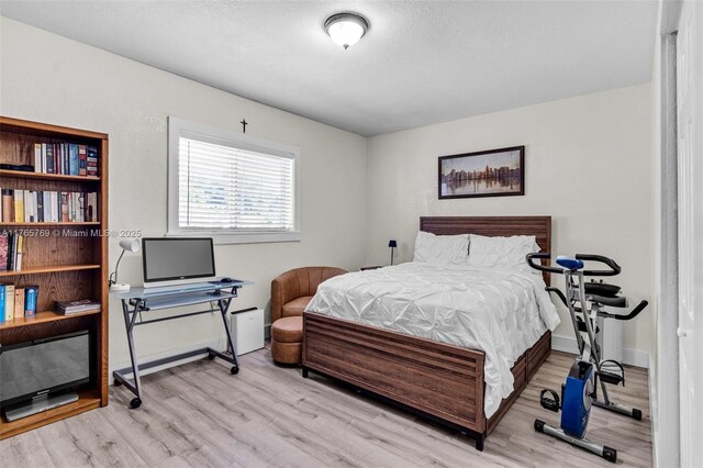 1522 NE 148th St, Miami, FL 33161 - bedroom featuring baseboards and wood finished floors