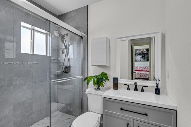 1522 NE 148th St, Miami, FL 33161 - bathroom with vanity, toilet, and a stall shower