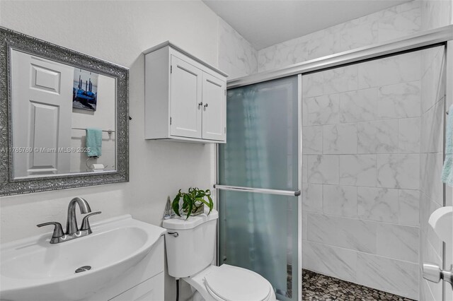 1522 NE 148th St, Miami, FL 33161 - bathroom with vanity, toilet, and a stall shower
