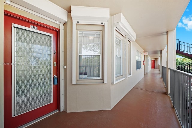 12950 SW 4th Ct Unit 309H, Pembroke Pines, FL 33027 - entrance to property with stucco siding and a balcony