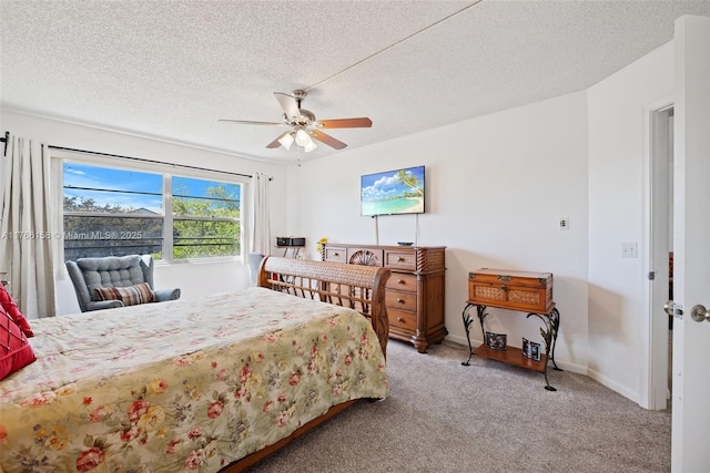 12950 SW 4th Ct Unit 309H, Pembroke Pines, FL 33027 - bedroom with baseboards, a textured ceiling, ceiling fan, and carpet flooring